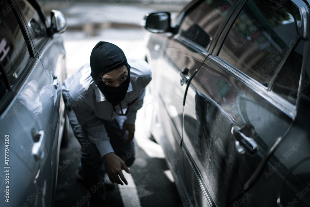 robber in black mask. robbery and crime concept. robber in black mask. robbery and crime concept.