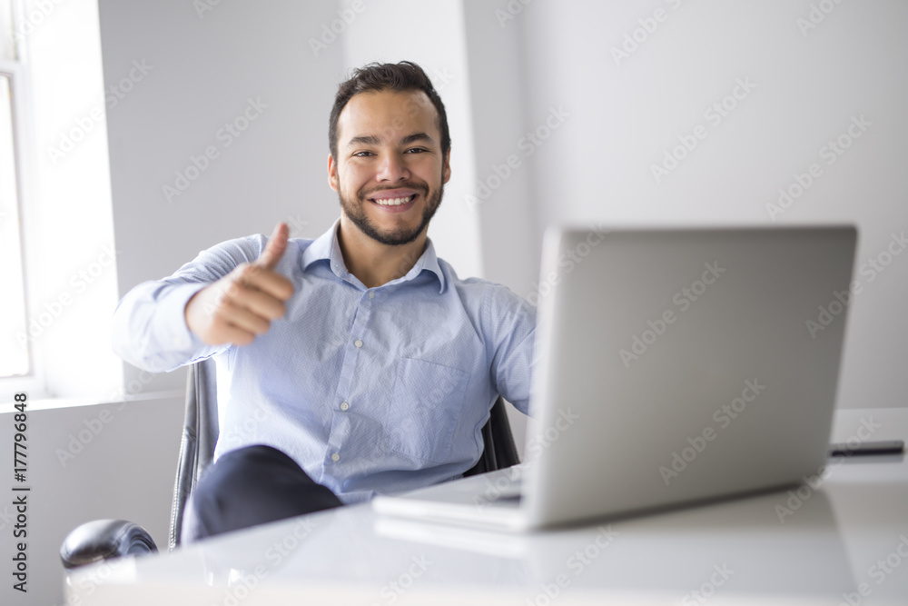 mexican attractive businessman on his 30s working at modern home office with computer laptop mexican attractive businessman on his 30s working at modern home office with computer laptop