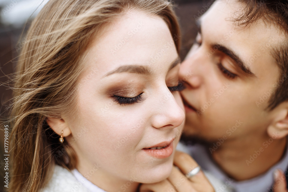 Happy hipster couple on holiday having fun and enjoy the time. Couple in love kissing and hugging. Shallow depth of field. Happy hipster couple on holiday having fun and enjoy the time. Couple in love kissing and hugging. Shallow depth of field.