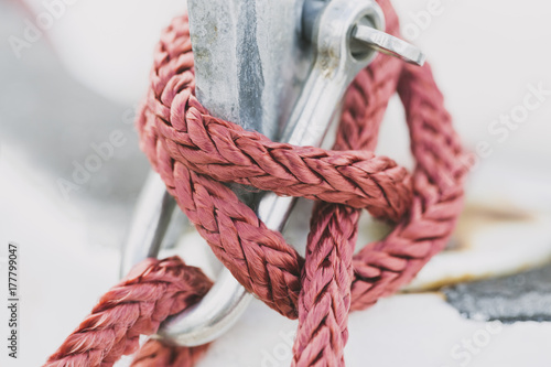 Red rope tied in a secure nautical knot