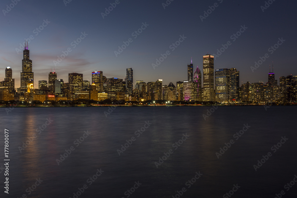 Chicago skyline in the evening with calm water