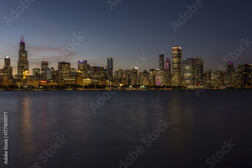 Chicago skyline in the evening with calm water