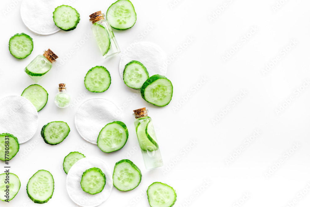 Sliced cucumber for face mask on white background top view copyspace Sliced cucumber for face mask on white background top view copyspace