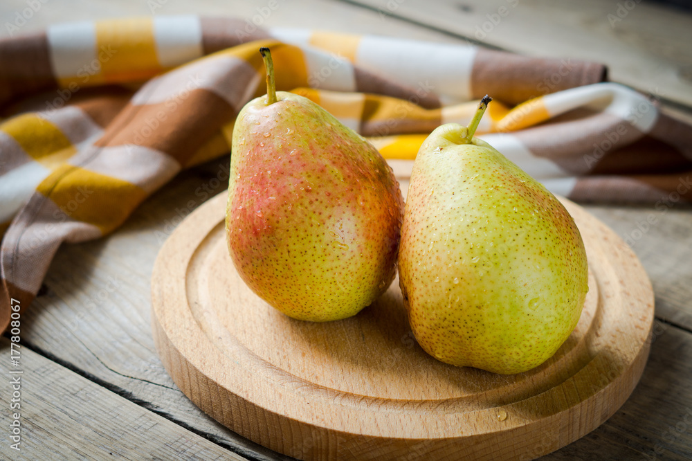 two ripe yellow pears
