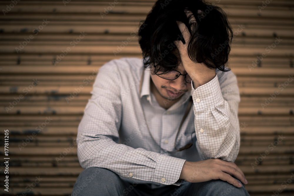 business man is stressed from his work. depression and anxiety concept. business man is stressed from his work. depression and anxiety concept.
