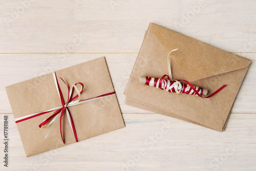 Craft envelopes on wooden background