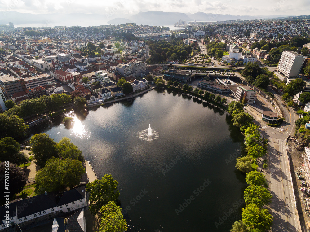 Fountain in the middle of lake in Stavanger city, aerial view