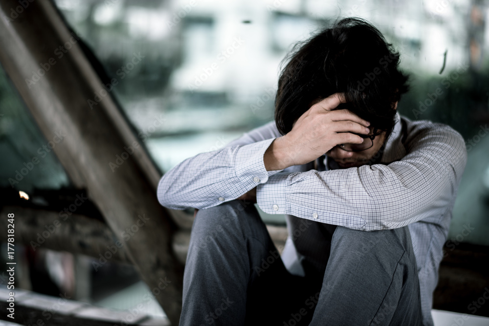 business man is stressed from his work. depression and anxiety concept. business man is stressed from his work. depression and anxiety concept.