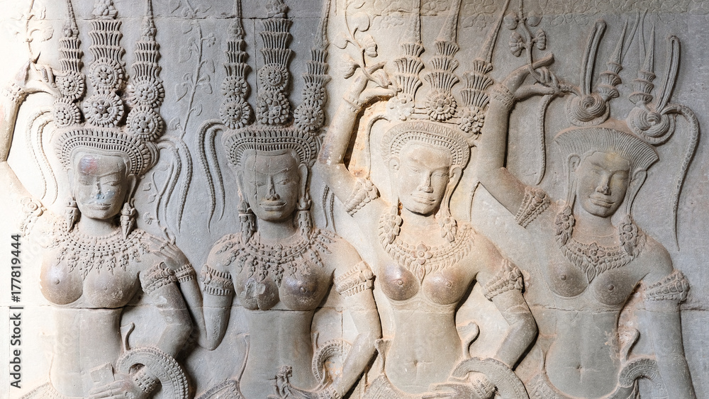 4 Apsara on the wall of Angkor Wat with shade of light, Siem Reap, Cambodia