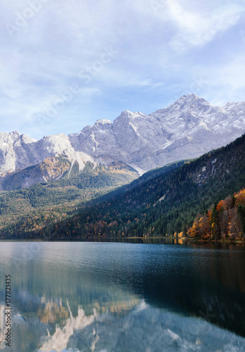 Captivating scene of the snow rocky massif. Mountain with beautiful lake