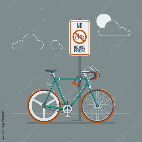 bike locked to a sign