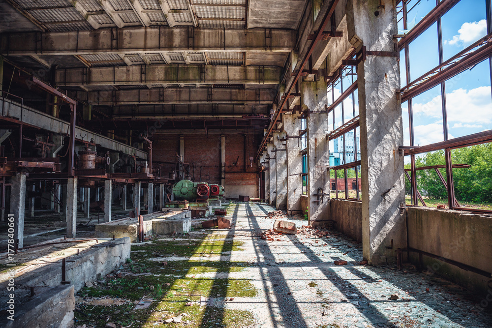 Abandoned industrial creepy warehouse inside old dark grunge factory building