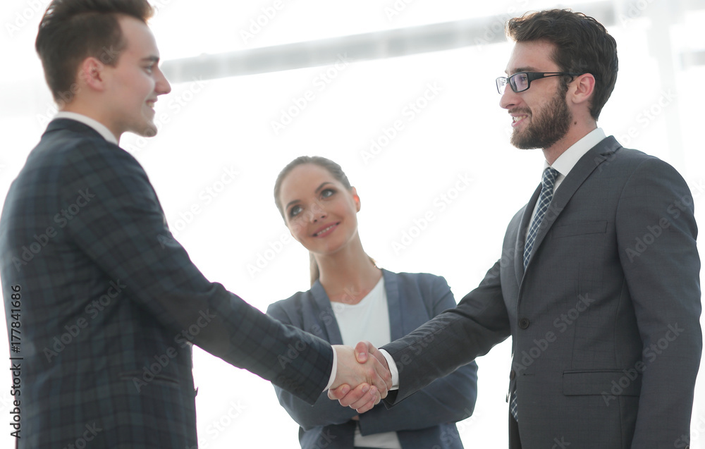 reliable handshake of business people reliable handshake of business people