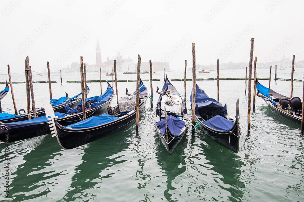 Venice, Italy - October, 2017: View gondola old city center buildings and canal in Venice, Italy. Tourist destination.