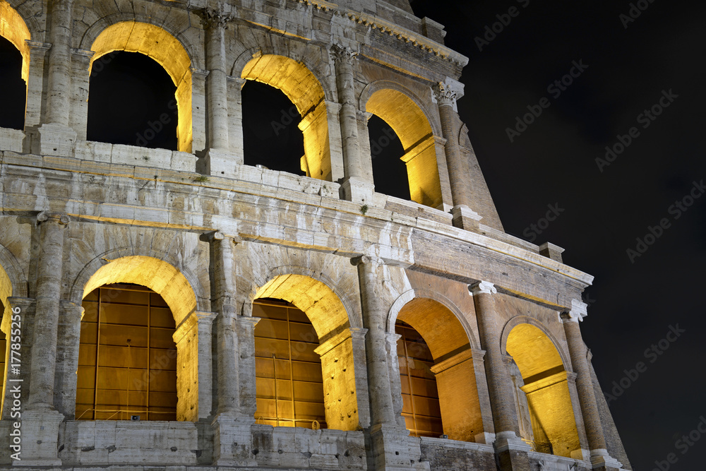 Fototapeta premium The Colosseum at night, a place where gladiators fought as well as being a venue for public entertainment, Rome Italy