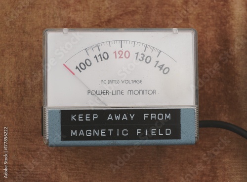 A vintage power-line monitor that also reads keep away from magnetic field.