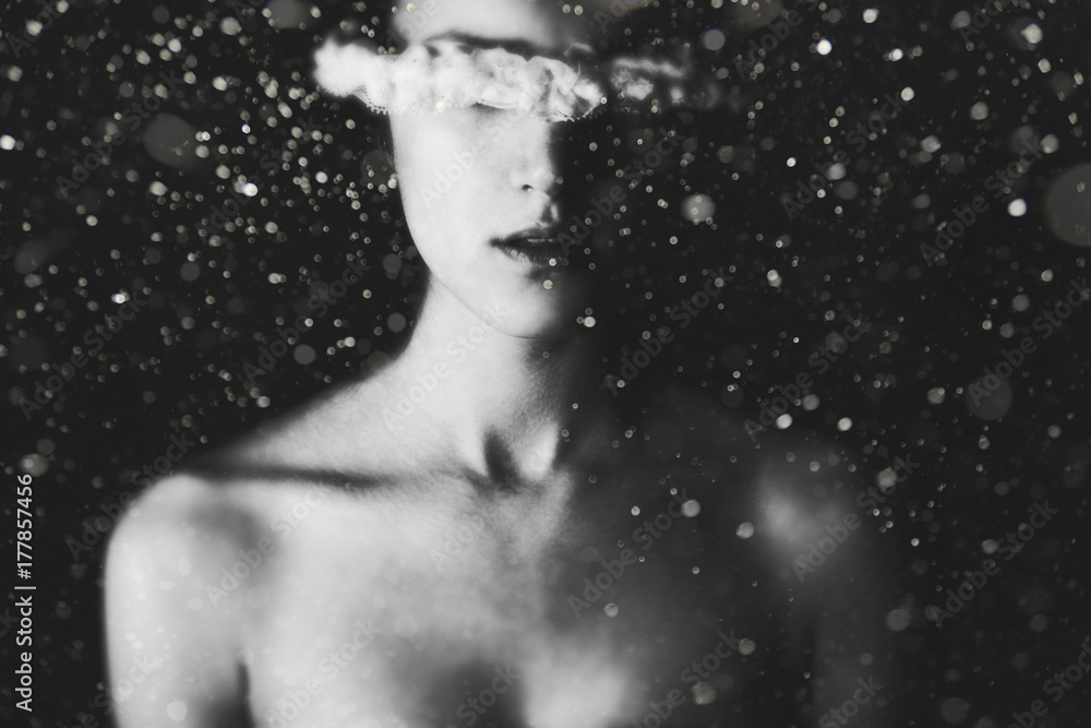 © Sanja Lydia/Stocksy - Girl in the snow with lace covering her eyes © Sanja Lydia/Stocksy - Girl in the snow with lace covering her eyes