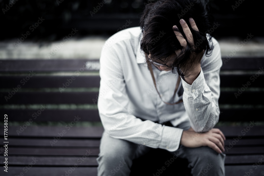 business man is stressed from his work. depression and anxiety concept. business man is stressed from his work. depression and anxiety concept.