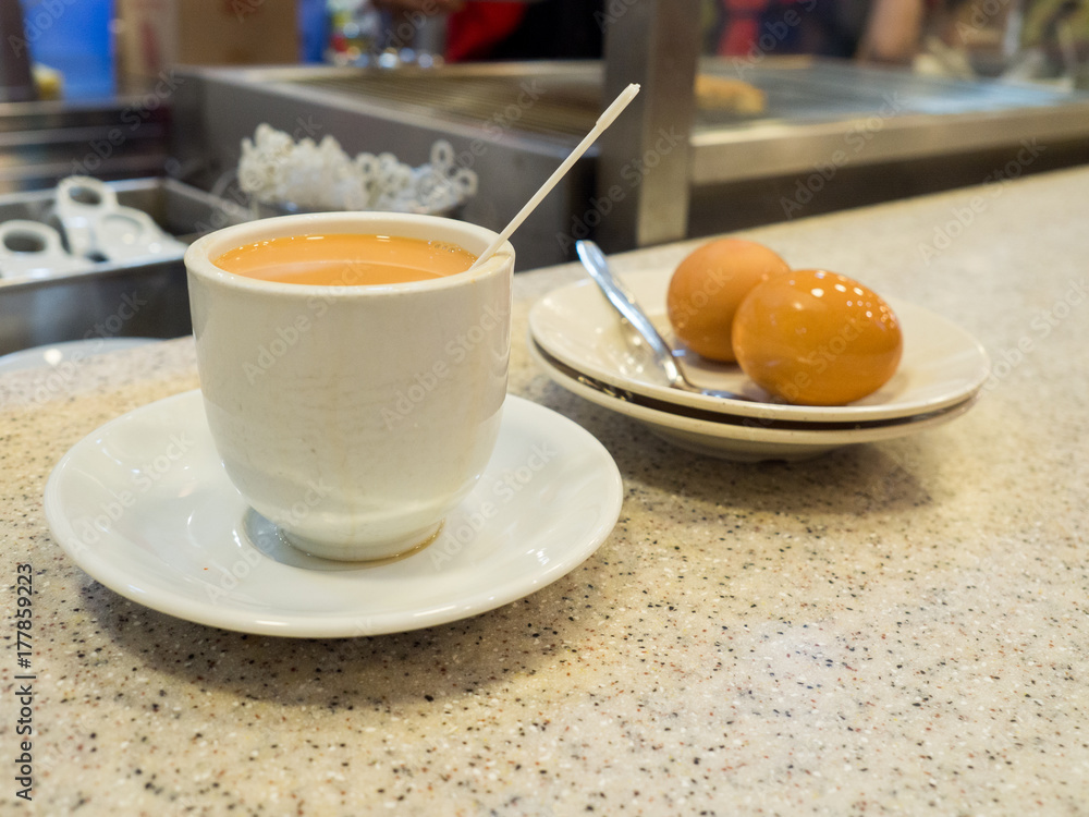 Singapore Breakfast called Kaya Toast, Coffee bread and Half boiled eggs Singapore Breakfast called Kaya Toast, Coffee bread and Half boiled eggs