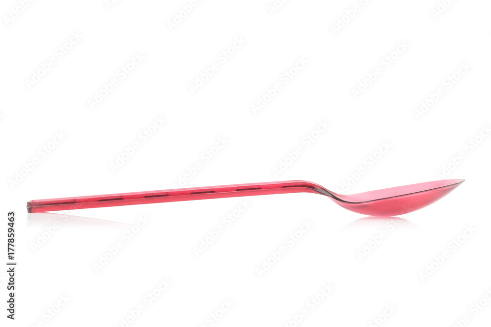 Red plastic spoon isolated on white Red plastic spoon isolated on white