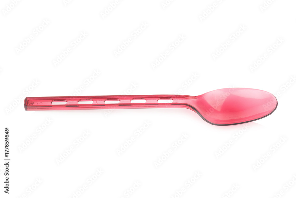 Red plastic spoon isolated on white Red plastic spoon isolated on white