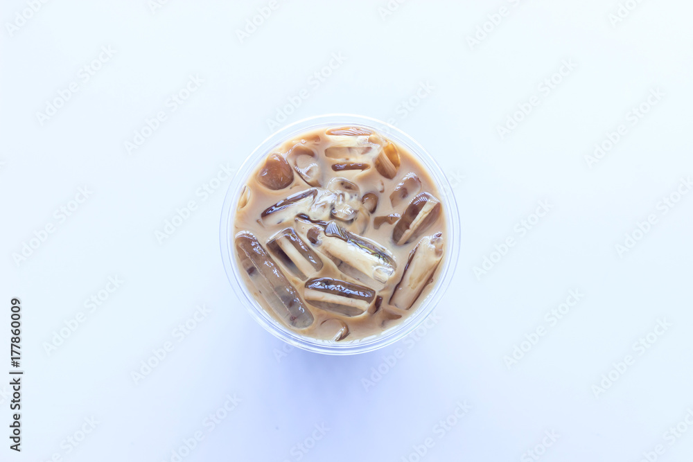 Top view of iced coffee in glass on white background Top view of iced coffee in glass on white background