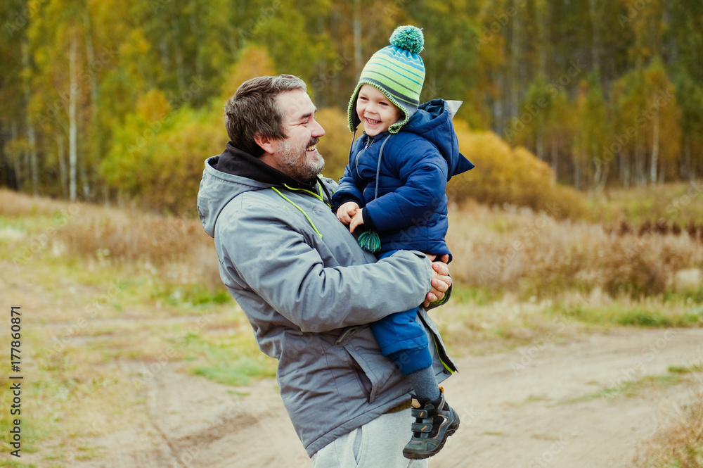 Father and son having fun outside.