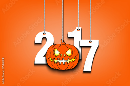 Halloween numbers 2017 and pumpkin hanging on a ropes