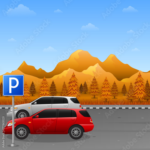 Autumn mountains landscape with parking zone sign and two car