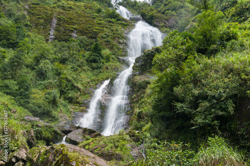 Spectacular view on waterfall in tropical forest