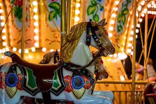 Carousel at fun fair photo