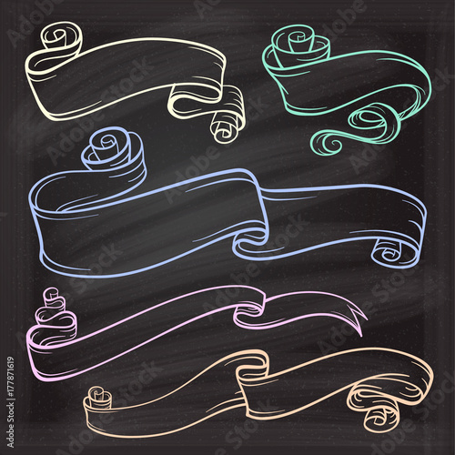 Vector set of vintage doodle scrolls and ribbons on a chalkboard background