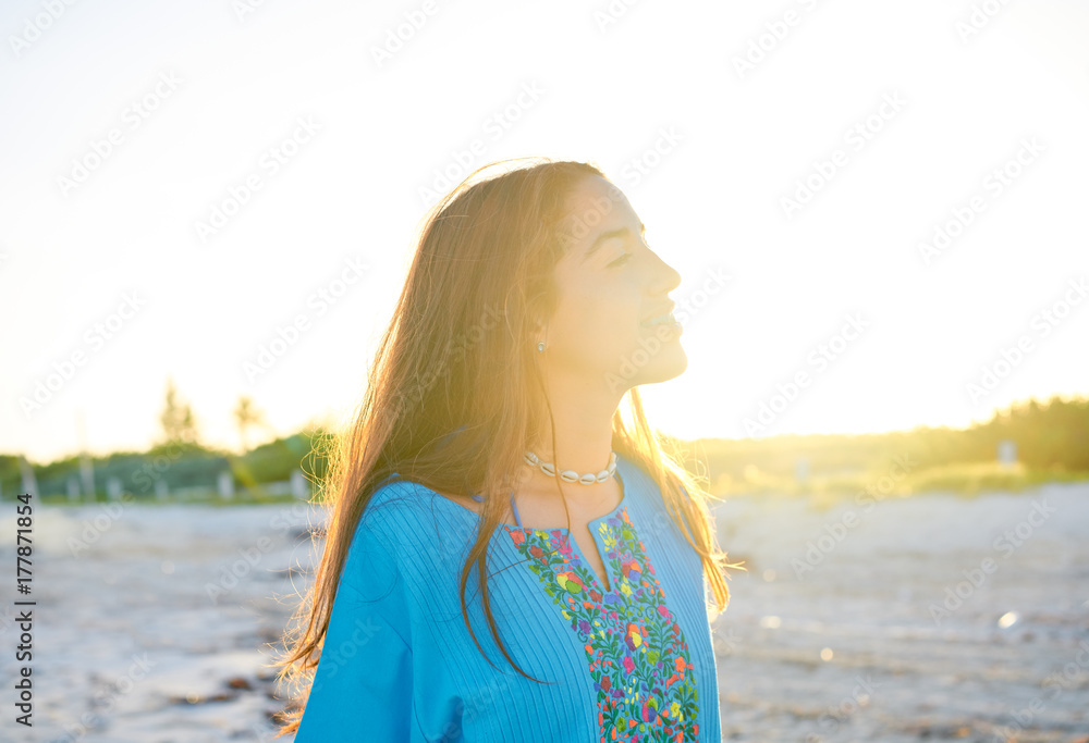 Latin beautiful girl happy in beach sunset Latin beautiful girl happy in beach sunset