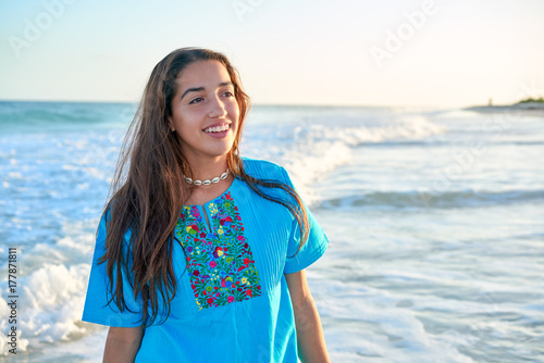 Latin beautiful girl in Caribbean beach sunset