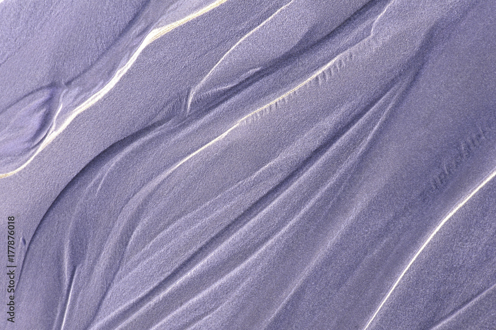 patterns of color and texture low receding tide on a Pacific Coast ...