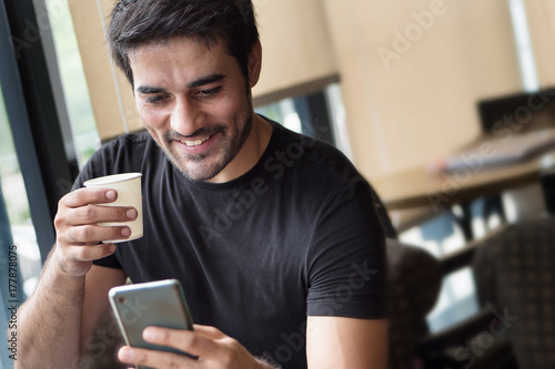 happy man using smartphone app