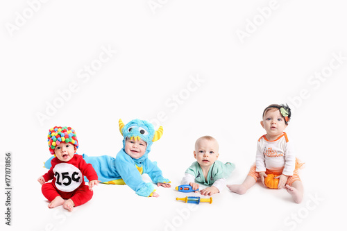 Babies dressed up in Halloween Costumes