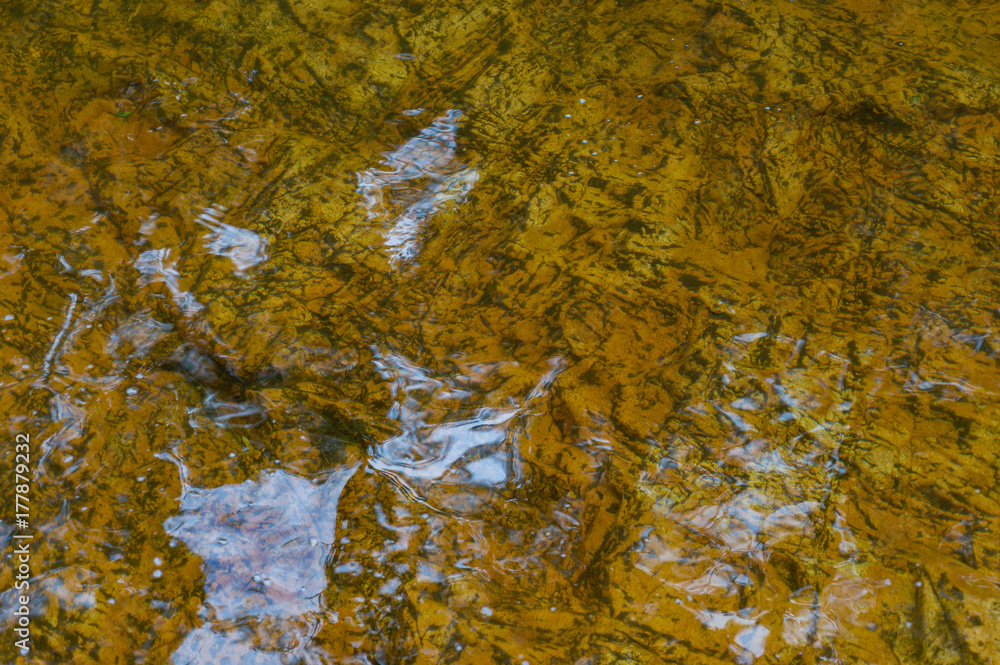 Rock covered with water Rock covered with water
