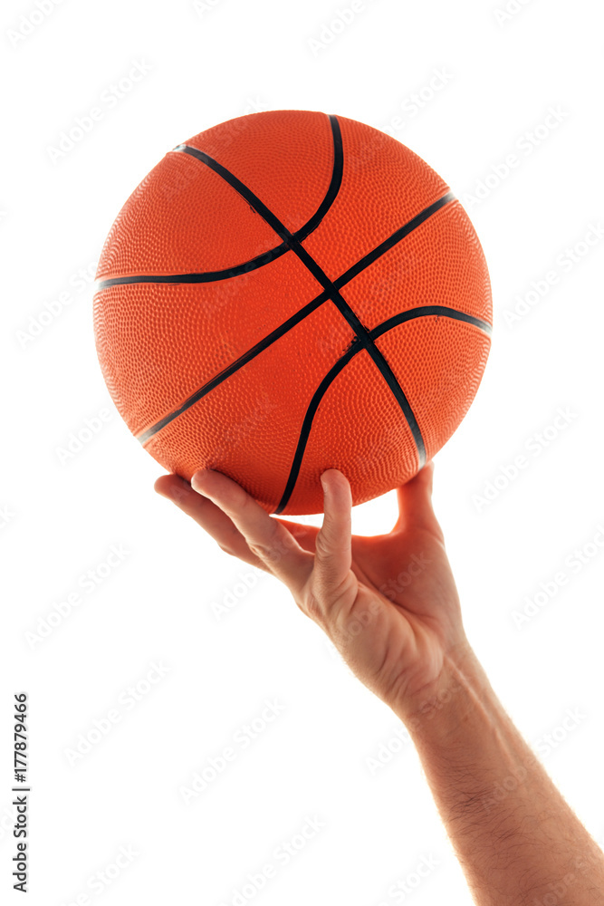 Male hand with basketball ball isolated on white background