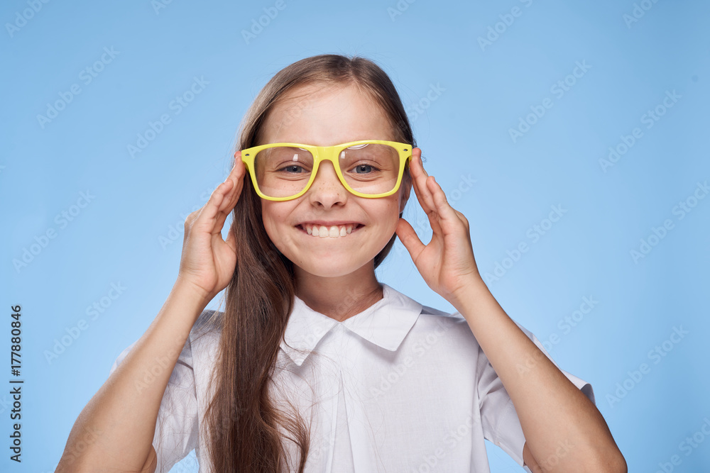 little girl in yellow glasses is happy little girl in yellow glasses is happy