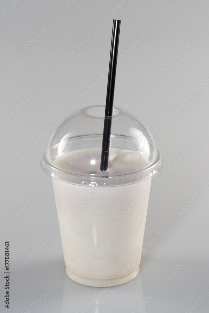 smoothie in plastic cup Milkshake isolated on a white background smoothie in plastic cup Milkshake isolated on a white background