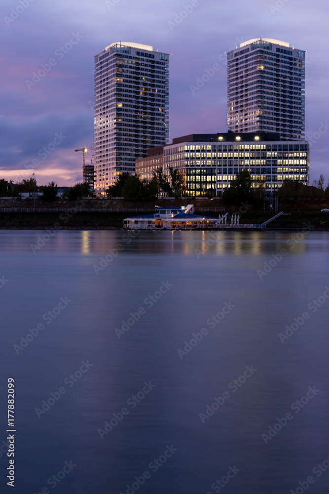 Naklejka premium Highrise buildings near Danube river. Bratislava, Slovakia. Portrait.