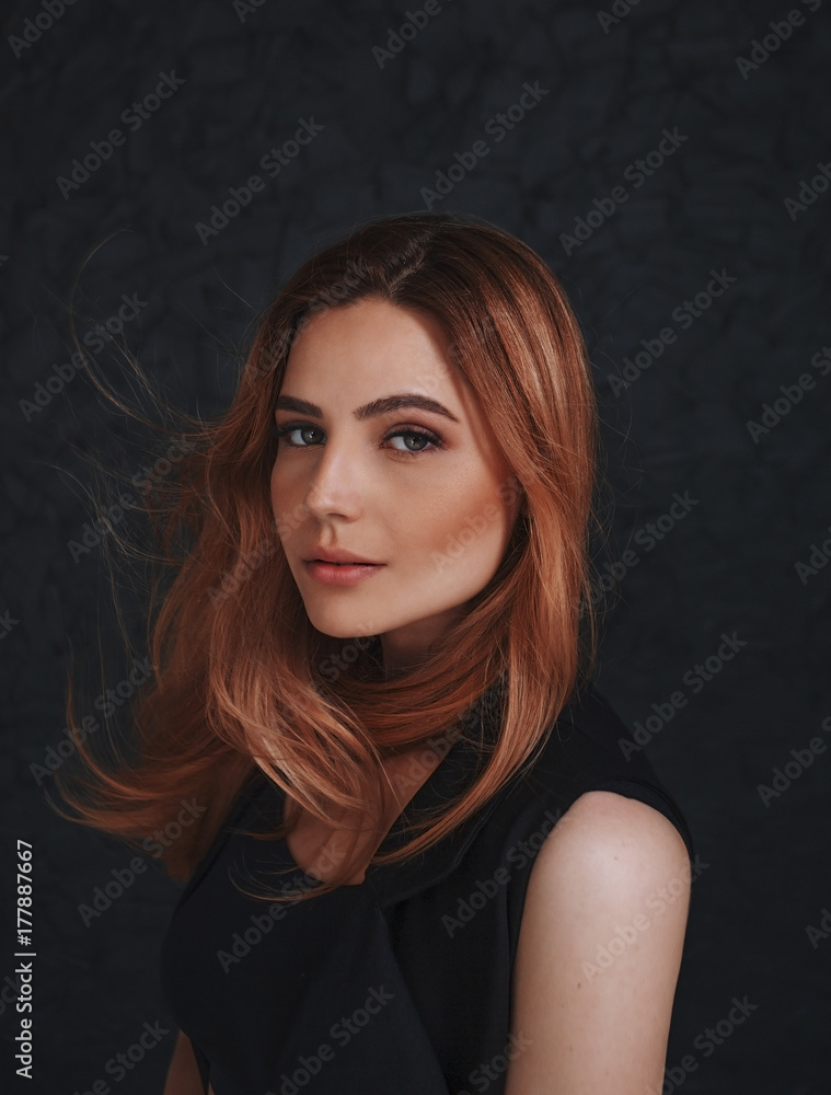 Portrait of girl with beautiful hair, eyes on a black background Portrait of girl with beautiful hair, eyes on a black background