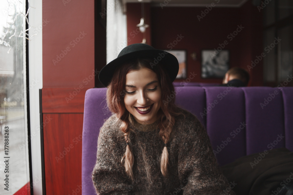 Girl with a beautiful smile in a coffee shop Girl with a beautiful smile in a coffee shop