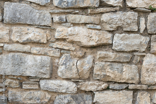 old wall with a stone