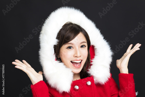 Happy young woman in winter clothes.