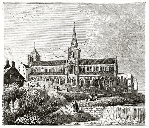  Old grayscale illustration of a path leading to an ancient cathedral. Glasgow Cathedral. By unidentified author, published on the Penny Magazine, London, 1835 photo