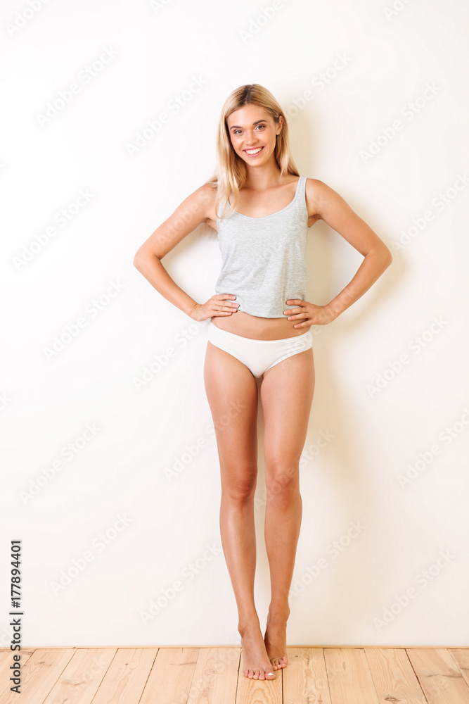 Fotografia do Stock: Full length portrait of a cute pretty girl in underwear