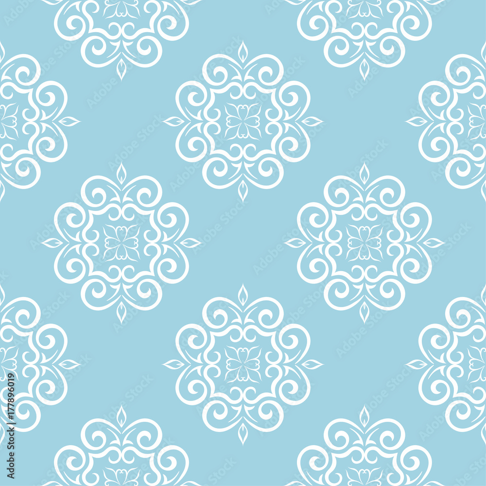 White floral seamless design on blue background