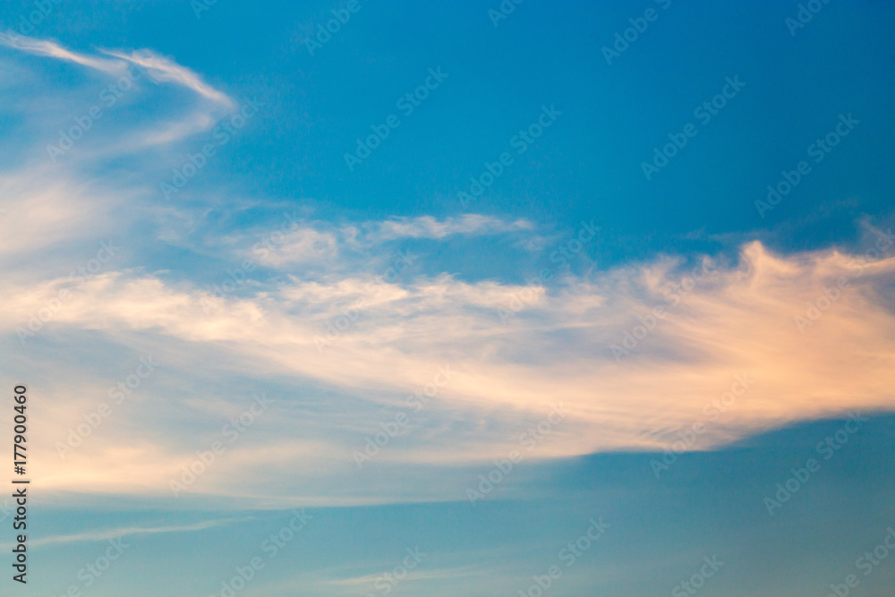 clouds in the sky at sunset as background